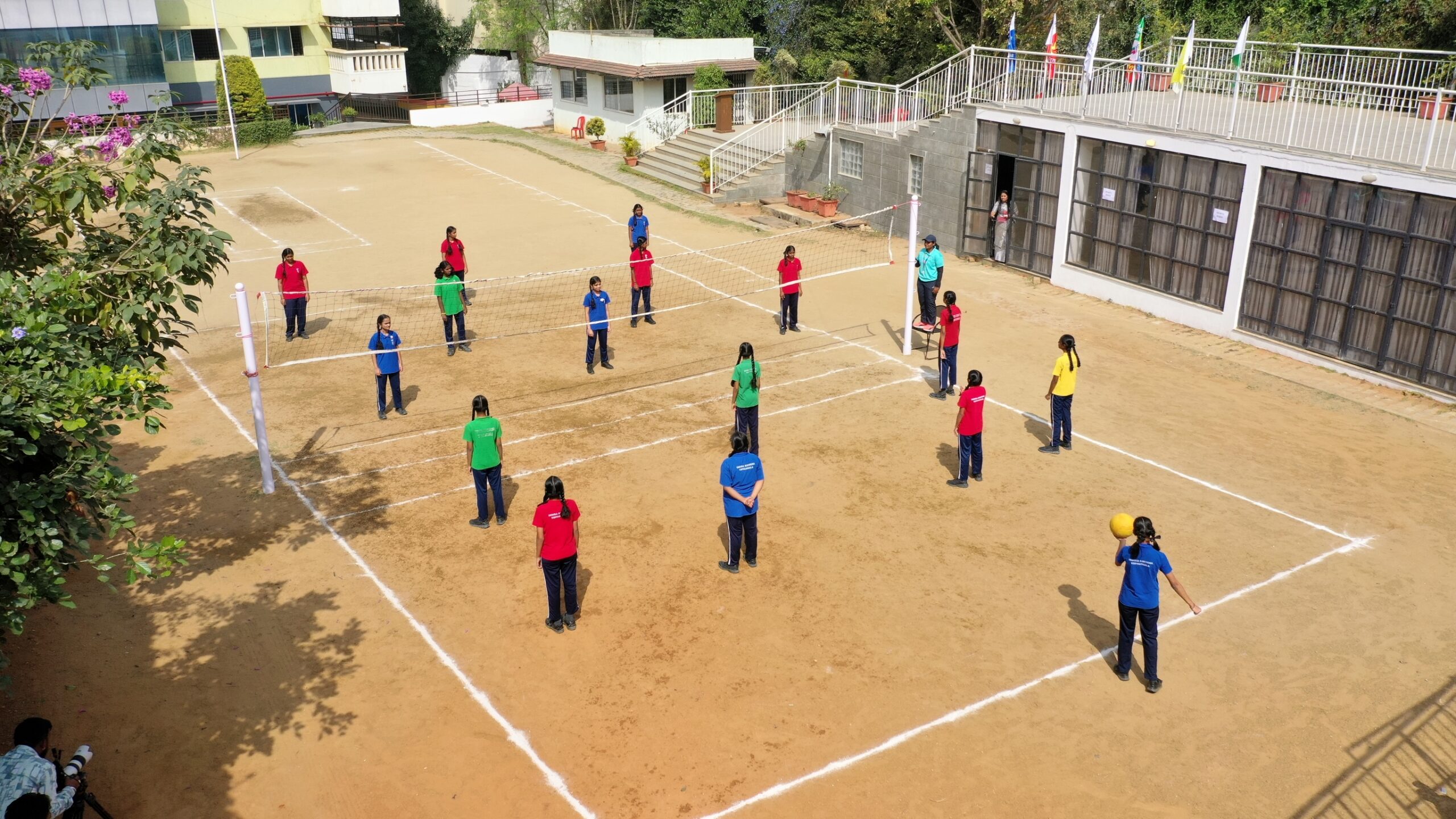 Students of Indira Krishna Vidyashala participating in a volleyball activity on the school playground – promoting physical education at one of the best CBSE schools in Bangalore