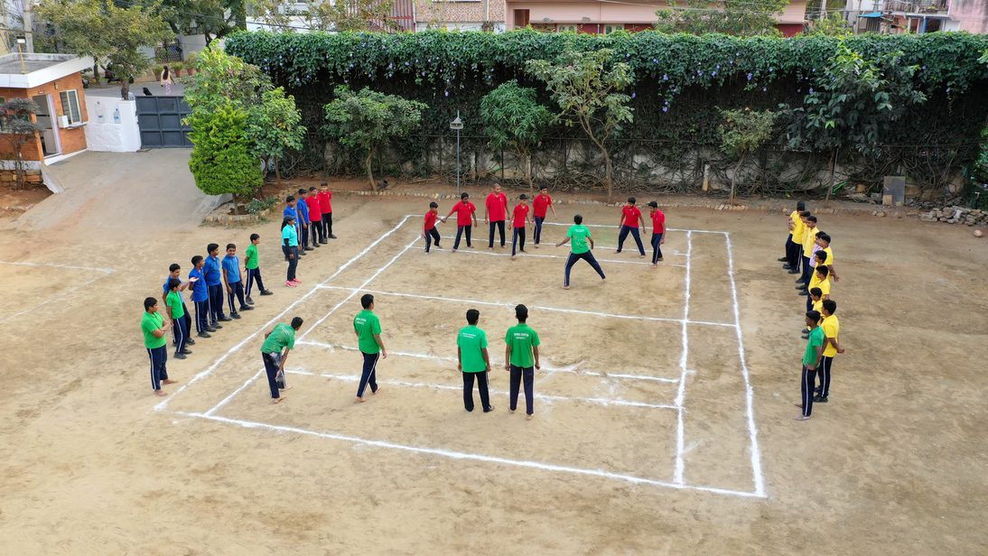 Students of Indira Krishna Vidyashala actively playing kabaddi during a sports session—encouraging teamwork and physical fitness at a leading CBSE school in Bangalore