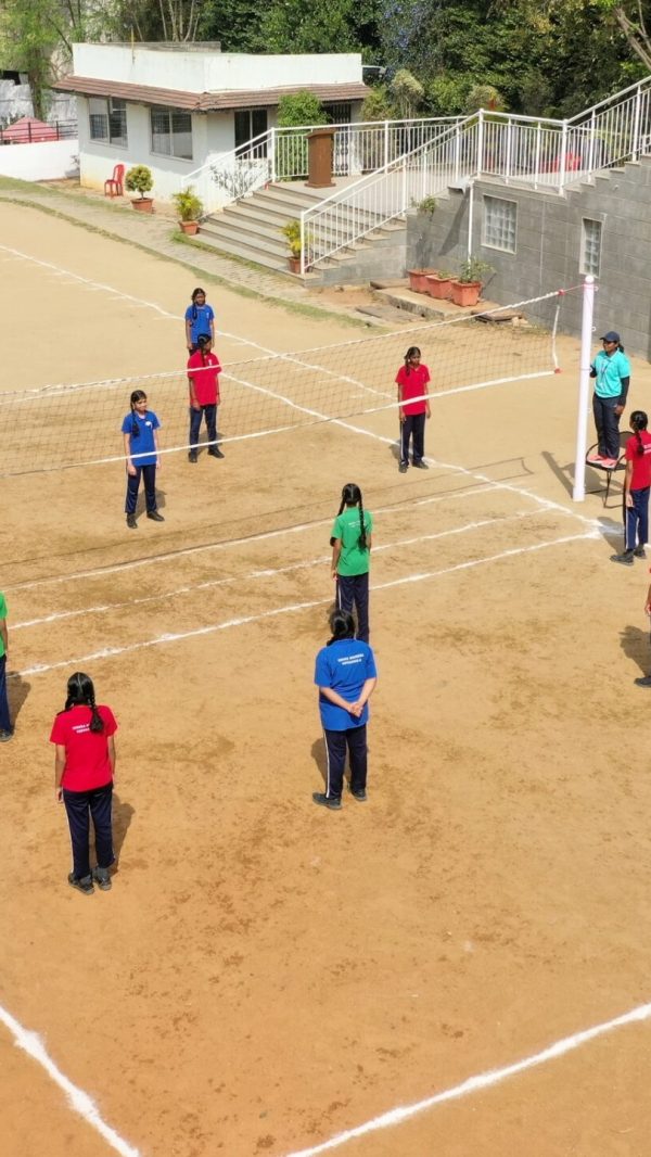 Students of Indira Krishna Vidyashala participating in a volleyball activity on the school playground – promoting physical education at one of the best CBSE schools in Bangalore