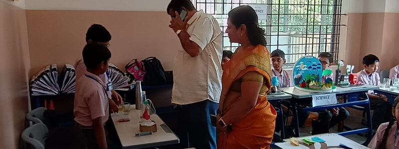 Happy parents sharing positive feedback about IKV School in Bangalore